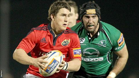 Ian Keatley of Munster in action against Connacht's John Muldoon