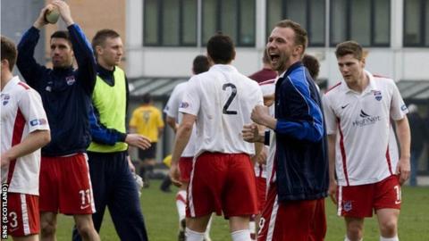 County's players celebrate their narrow win at Firhill