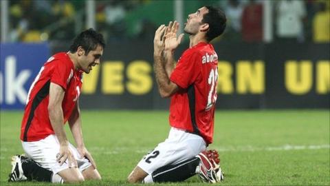 Mohamed Aboutrika - seen here celebrating Egypt's 2008 Nations Cup success - is back in the squad, but Ahmed Hassan (left) misses out