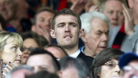 Darren Fletcher watches from the stand