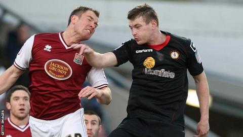 Crewe's Adam Dugdale (right) playing against Northampton