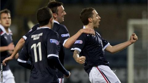 Jamie McCluskey (right) celebrates scoring against Ayr