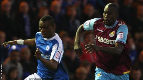 Gabby Zakuani and Carlton Cole