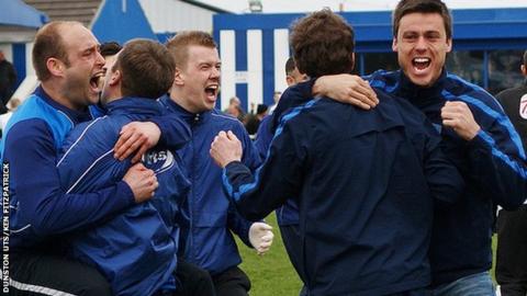 Dunston staff and players celebrate reaching the FA Vase final
