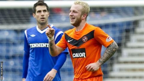 Johnny Russell (right) scored in United's cup victory at Ibrox