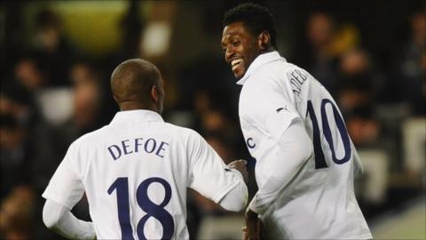 Emmanuel Adebayor celebrates a goal with Tottenham Hotspur team-mate Jermain Defoe