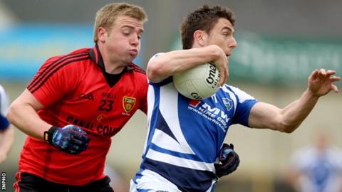 Arthur McConville battles with Colm Begley at Portlaoise