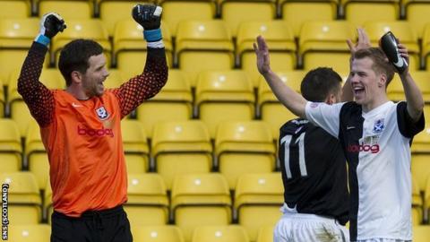 Ayr United goalkeeper Kevin Cuthbert and team-mate Jonathan Tiffoney