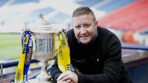 Former Hearts striker John Robertson with the Scottish Cup