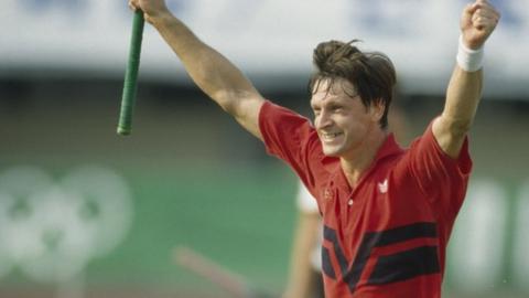 Britain's Sean Kerly celebrates hockey gold