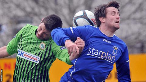 Darren McNamee of Donegal Celtic in action against Dungannon's Michael Ward