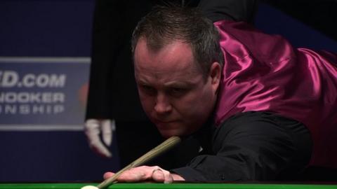 Defending world champion John Higgins