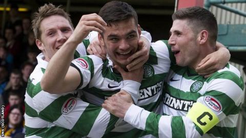 Celtic's Tony Watt (centre) celebrates opening the scoring with team-mates Gary Hooper (right) and Kris Commons