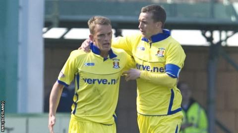 Kilmarnock penalty scorer Dean Shiels is congratulated by James Fowler