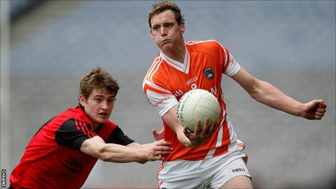 Down's Conor Maginn in action against Kieran Toner of Armagh