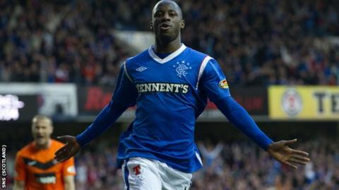 Aluko celebrates after scoring twice within three first-half minutes