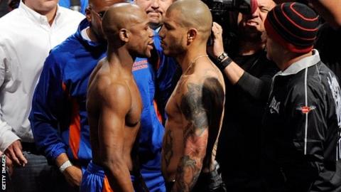 Floyd Mayweather and Miguel Cotto at the weigh-in