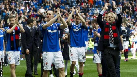 Rangers players applaud their fans after their final home match of the season