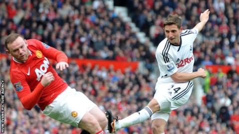 Joe Allen, Swansea City, and Wayne Rooney, Manchester United