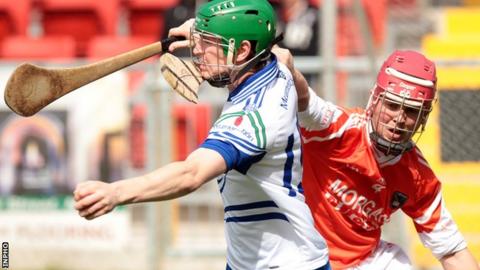 Monaghan's Ronan Meehan battles with Armagh's Fintan Woods in last year's Ulster Hurling Championship