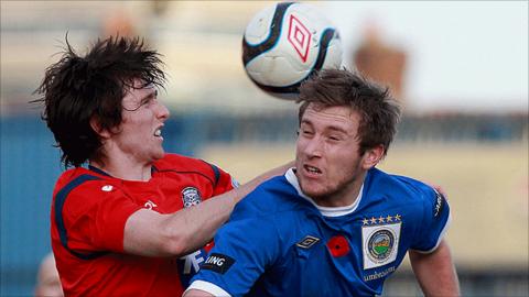 Coleraine's Howard Beverland and Mark McAllister of Linfield