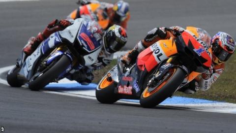 Dani Pedrosa (back), Jorge Lorenzo and Casey Stoner in action in Estoril