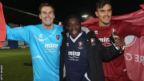Cheltenham Town players celebrate