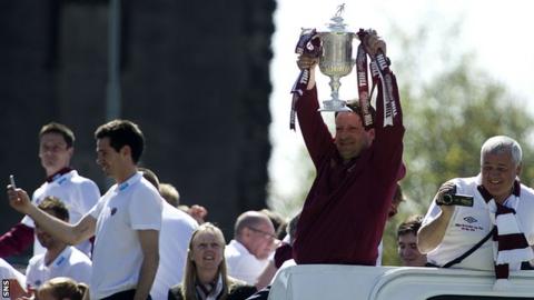 Sergio holds the Scottish Cup aloft as Hearts parade through Edinburgh