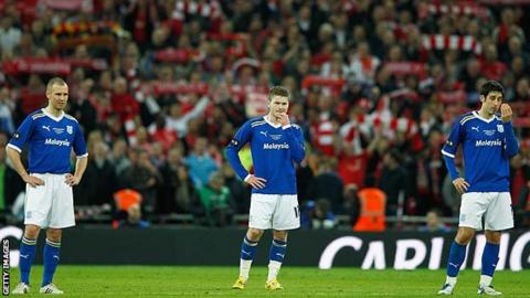 Kenny Miller, Arron Gunnarsson and Peter Whittingham contemplate the Carling Cup final defeat to Liverpool