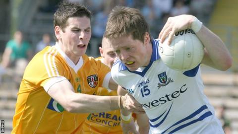 Antrim's Kevin O'Boyle challenges Monaghan's Conor McManus