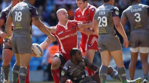 Salford's Adam Sidlow celebrates after scoring in the win over Huddersfield