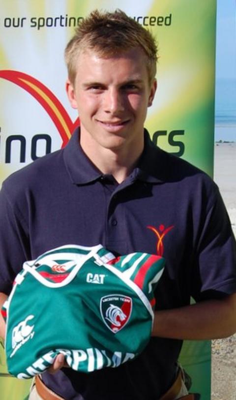 Luke Jones with a Leicester Tigers shirt