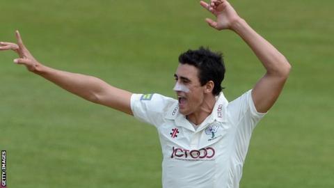 Mitchell Starc celebrates a wicket for Yorkshire