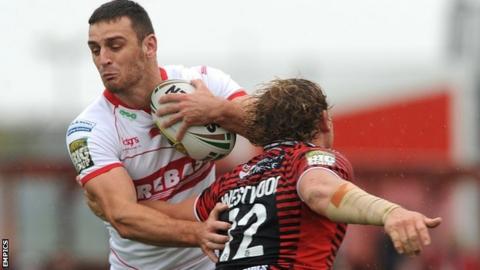 Craig Hall is stopped by Ben Westwood