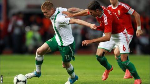 Damien Duff of the Republic of Ireland in action against Hungary's Peter Halmosi