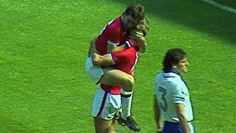 Bryan Robson celebrates his opening goal against France at 1982 World Cup