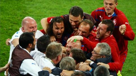Head Coach Michal Bilek of Czech Republic is mobbed by players and staff at the final whistle