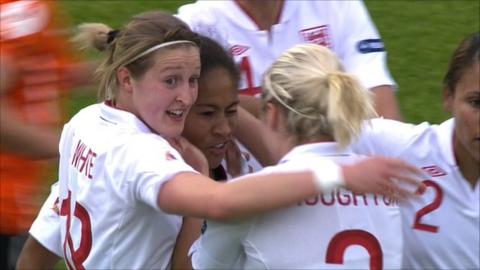 Rachel Yankey is congratulated by her team-mates