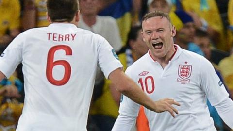 Wayne Rooney celebrates scoring against Ukraine
