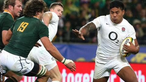 England centre Manu Tuilagi takes on the South Africa defence
