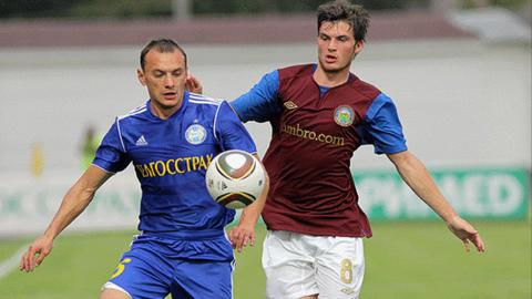 FC BATE's Aliaksandr Yurevich in 2011 Champions League action against Linfield's Philip Lowry