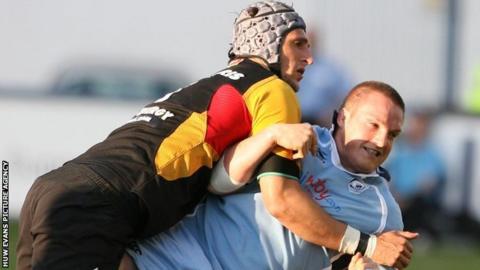 Luke Charteris tackles Gethin Jenkins