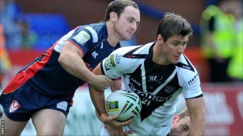 Widnes' Dave Allen is tackled by Lance Hohaia of St Helens during Sunday's Super League match at the Stobart Stadium
