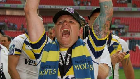 Lee Briers celebrates one of his two Challenge Cup victories with Warrington Wolves