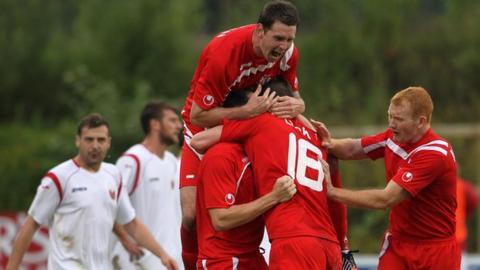 Portadown celebrate Richard Lecky's equaliser