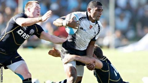 Nikola Matawalu (centre) in action against Scotland