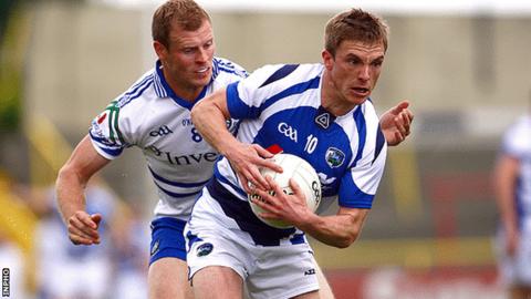 Monaghan's Eoin Lennon in action against Ross Munnelly of Laois