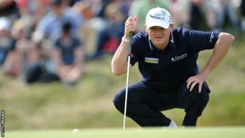 Paul Lawrie eyes up a putt at Royal Lytham and St Annes