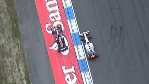 Vettel passes Button