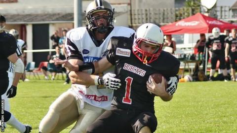 Cornish Sharks GB linebacker Matt Henderson sacks Bournemouth's quarterback